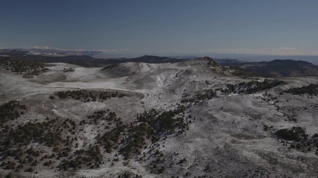 Aerial Flyover fishlake national forest and the Cathedral Valley after a snow storm, Utah