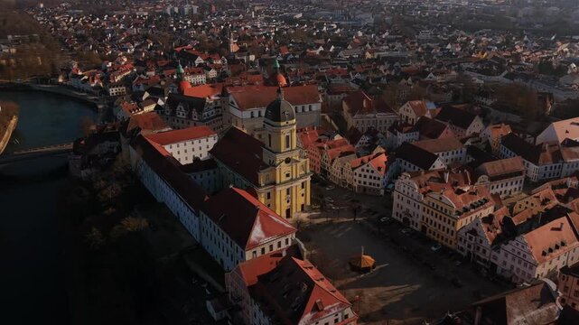 Scenic cityscape panorama of the historic center in Neuburg an der Donau Upper Bavaria following ancient alleyways and residential architecture near the Danube river bank