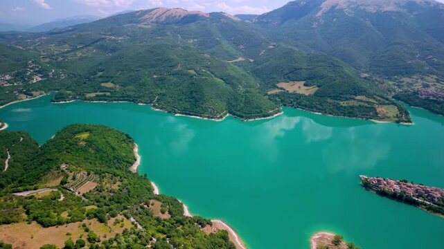 Lake Turano Lazio Italy Aerial Drone High Angle Panoramic View Over Colle di Tora and Castel di Tora Most Beautiful Italian Villages Turquoise Lake Mountain Scenery Travel Video 4K UHD