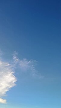 Beautiful Blue Sky with Dramatic White Clouds Vertical Stock Video
