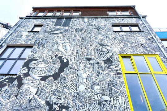Berlin, Germany - June 20, 2026: Vibrant Black and White Street Art Mural on Building Facade in Berlin