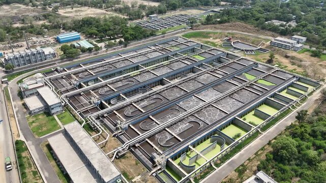 Aerial drone view of large wastewater treatment plant and sewage treatment facility in Delhi India