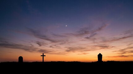 Fototapeta premium Silhouettes of Crosses at Sunset with Dramatic Sky and Moon in Rural Landscape