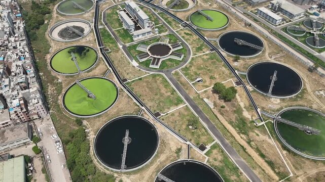 Aerial drone view of large wastewater treatment plant and sewage treatment facility in Delhi India