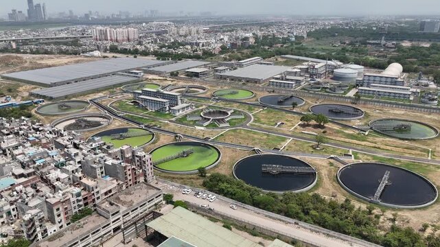 Aerial drone view of large wastewater treatment plant and sewage treatment facility in Delhi India
