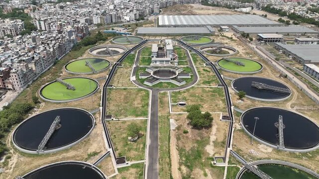 Aerial drone view of large wastewater treatment plant and sewage treatment facility in Delhi India