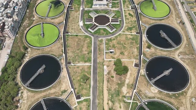 Aerial drone view of large wastewater treatment plant and sewage treatment facility in Delhi India