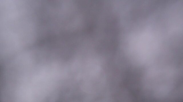 Completely blurred gray background with handheld camera movement and a minimalist look for audiovisual resources