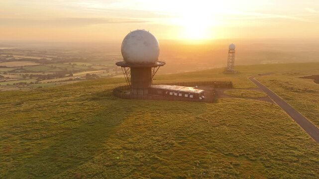 satellite dish at sunrise