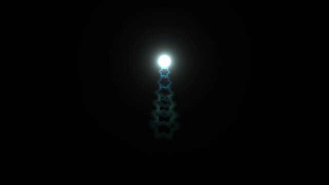 Light beam rising through darkness creating star shapes