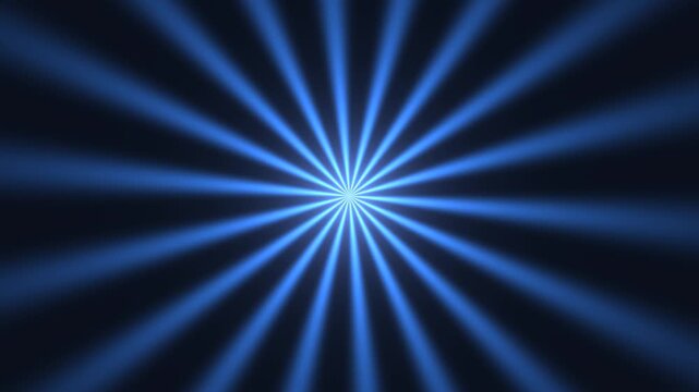 Light rays create a blue radial pattern on a dark background