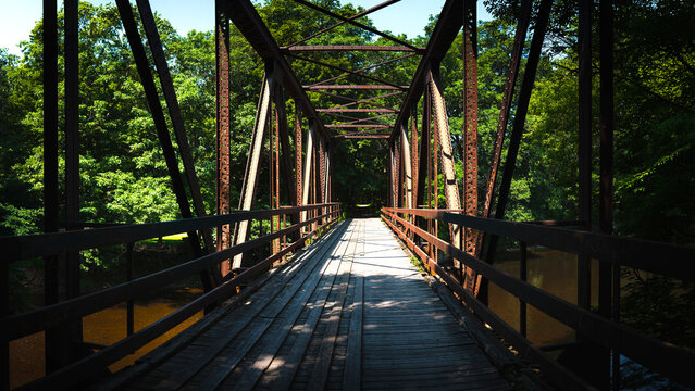 Claremont Railway Bridge over the Sugar River in Claremont, New Hampshire, built in 1903, a historic riveted steel Warren deck truss bridge in New England, United States of America