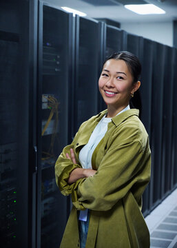 Portrait of Asian Female Engineer Working in Modern Data Center