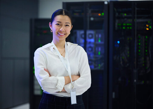 Portrait of Asian Female Engineer Working in Modern Data Center