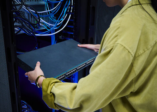 Female Technology Engineer Monitoring Enterprise Servers
