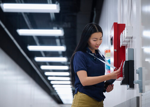 Technology Professional Scanning Badge to Access Server Room