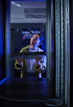 Female Technology Engineer Monitoring Enterprise Servers