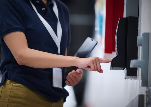 IT Professional Using Biometric Access to Enter Data Center