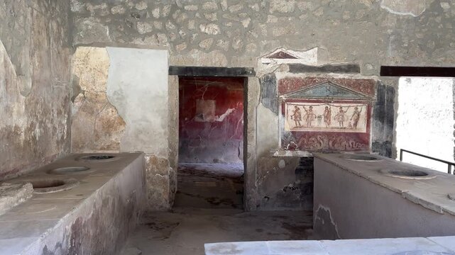 Ancient Roman Thermopolium Fast Food Counter with Frescoes in Pompeii