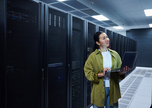 Female Technology Engineer Monitoring Enterprise Servers