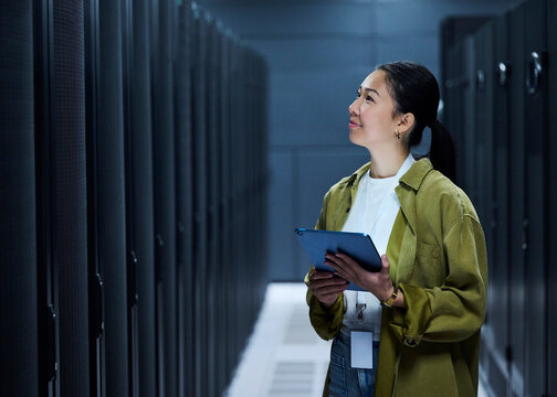 Female IT Professional in Data Center