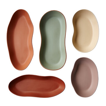 Set of five organic shaped ceramic serving dishes in assorted earthy pastel colors