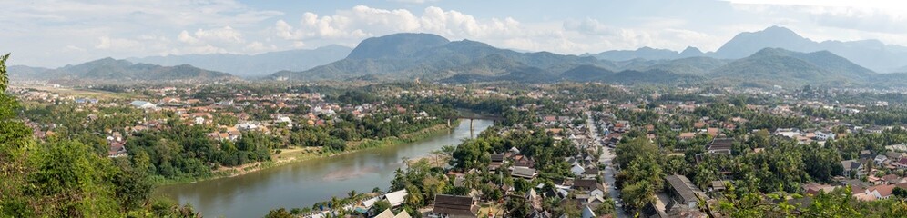 Naklejka premium Luang Prabang cityscape with Mekong River and mountains, Laos
