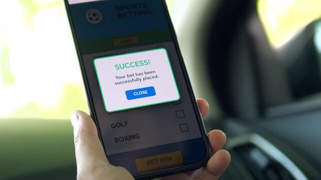 Modern sports enthusiast placing a live bet while traveling. Detailed view of a smartphone screen with interactive checkmarks and win notification. Essential for marketing betting apps and digital
