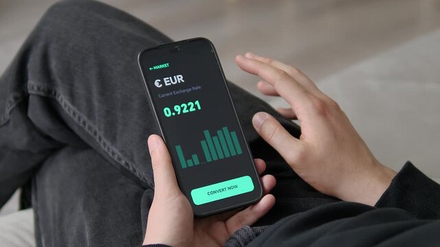 Sleek dark-mode financial interface displaying EUR rates with a dynamic bar graph. Clean layout with a prominent conversion button. Ideal for FinTech app portfolios, UX design showcases, and modern ba