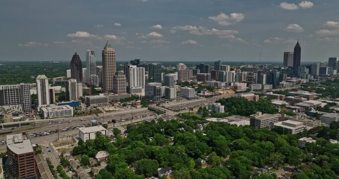 Atlanta Georgia Aerial v829 panoramic panning views capturing cityscape of downtown, Midtown, Buckhead and Atlantic Station and busy Interstate 85 highway traffics - Shot with Mavic 3 Cine - May 2022