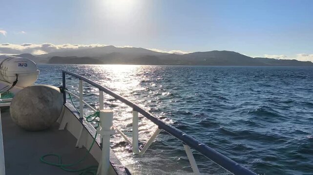 Azores, Portugal. Passenger ferry crossing the Atlantic Ocean from Faial to Pico Island with scenic coastal views and the beautiful volcanic landscape of the Azores.