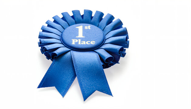 Blue ribbon rosette with first place text isolated on white background.