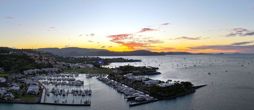 Spectacular aerial sunset of Airlie Beach Whitsundays Queensland Australia