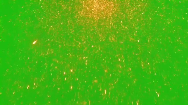 Falling golden particles and light sparkles against a chroma key green screen