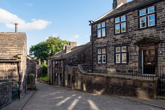 Scenic view of Town Gate in Heptonstall with old stone houses surrounding the road on the village main street