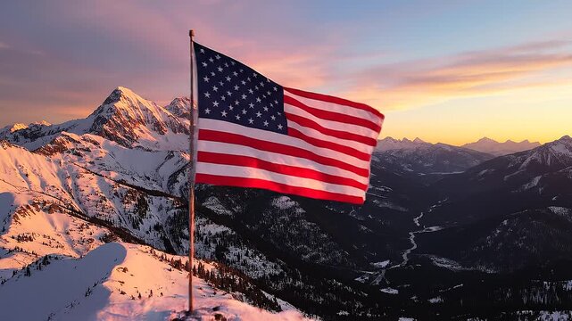 Capturing american flag against snowy mountain peaks during a sunset with golden light. Great for patriotic, scenic and outdoorthemed designs.