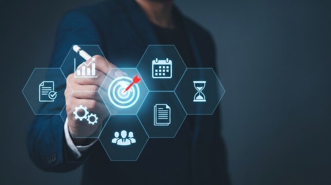 Business professional hand pointing at digital target icon to achieve strategic goals and corporate success