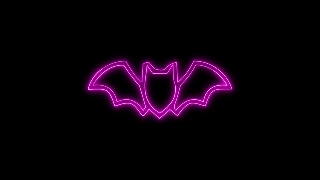 Neon pink bat outline glowing on black background for halloween holiday footage.