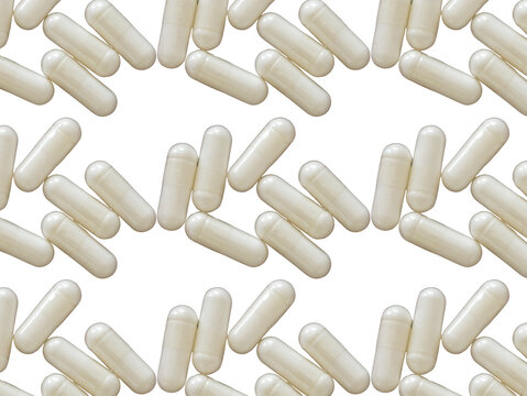 Varias capsulas  de color blanco colocadas en un fondo transparente 