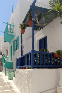 Title
Traditional narrow street with whitewashed buildings in Mykonos Chora, Greece