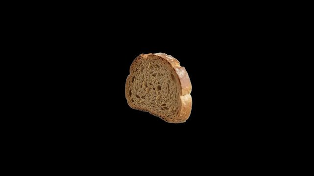 A single slice of crusty whole wheat grain bread rotating smoothly in a continuous 360-degree loop. Placed against a pitch-black background to emphasize the baked texture and details of the loaf.