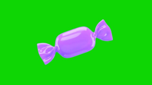 Glossy purple wrapped hard candy or bonbon levitating in mid-air against a bright green screen keying backdrop. Ideal for confectionery commercials, birthday party videos, Halloween promos, sweet trea