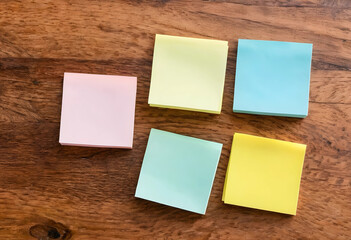 Fototapeta premium Colorful sticky notes on wooden table flat lay