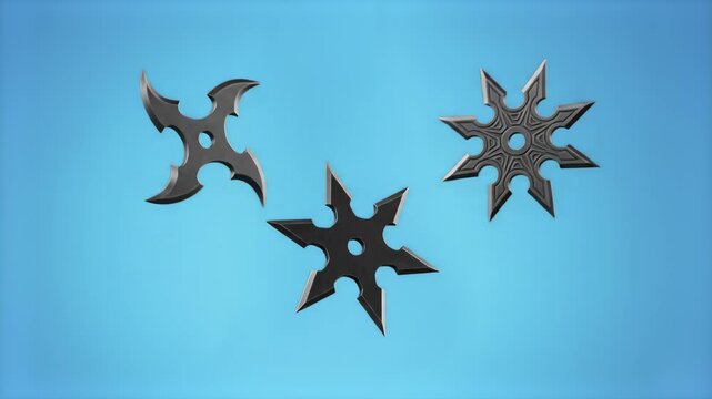 Traditional metallic Japanese ninja throwing stars falling or floating through the air. The animation is rendered against a clean, light blue backdrop suitable for gaming or action content.