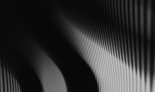 luxury black background with repeating vertical striped line patterns with organic deformation and asymmetrical composition with flowing curves
