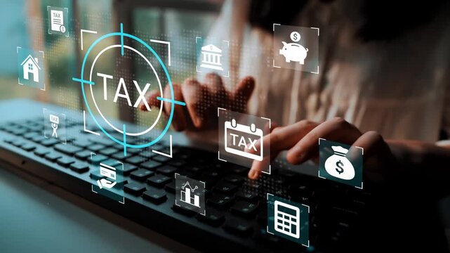 Hands on Keyboard with Virtual Tax Icons and Financial Symbols Displayed, Representing Tax Filing and Financial Management Concepts Gluon.