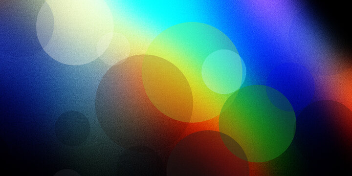 Abstract composition of colorful floating circles with bokeh light effect and grainy texture overlay for creative background.