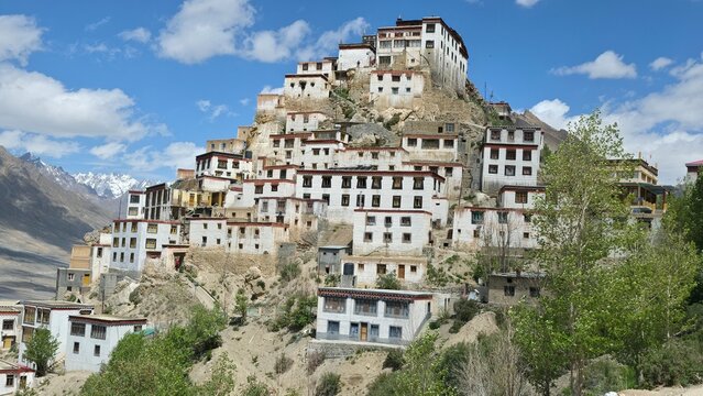 Ancient Key Monastery stands proudly above the valley, overlooking dramatic Himalayan mountain scenery.