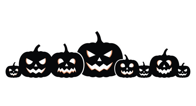 Group of spooky carved pumpkins with scary faces for Halloween celebration.