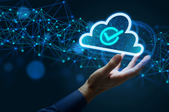 Cloud management system automating operational checks and network monitoring. IT engineer analyzing network communications and infrastructure activity. Businessman holding cloud hologram.